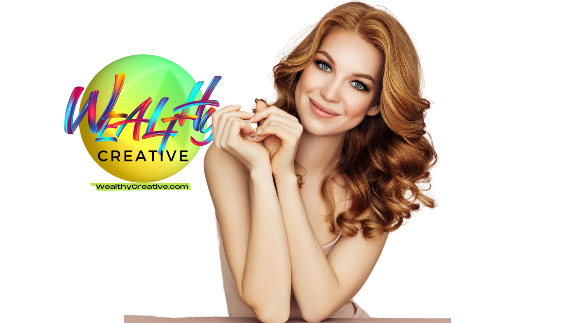 Beautiful woman with red hair smiling in front of the Wealthy Creative logo Beautiful woman with red hair smiling in front of the Wealthy Creative logo