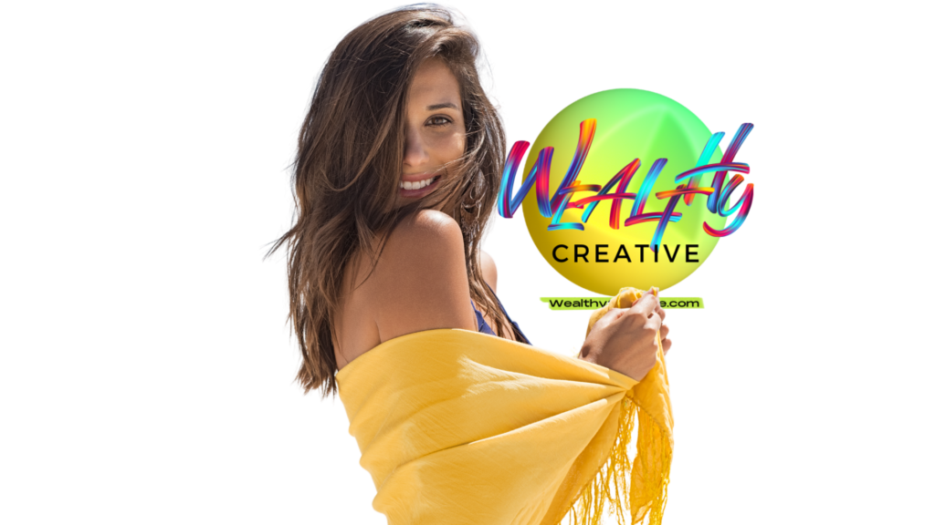 Happy, smiling, beautiful woman standing next to the Wealthy Creative logo Happy, smiling, beautiful woman standing next to the Wealthy Creative logo